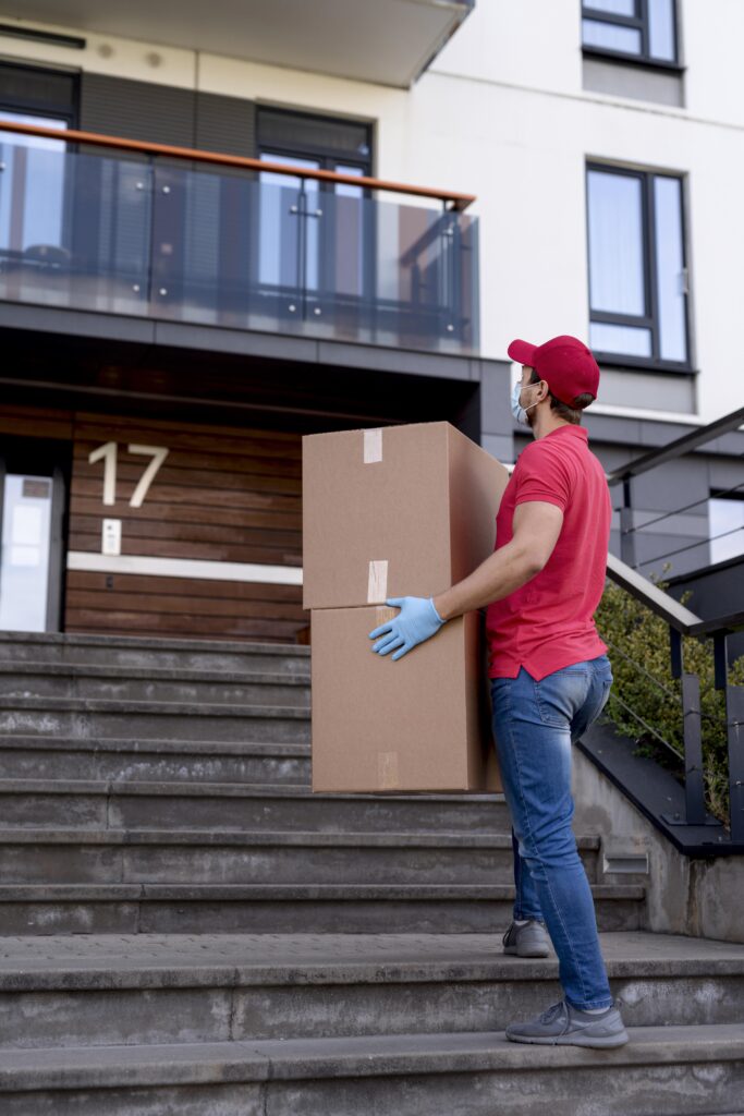 low angle delivery man with package low angle delivery man with package